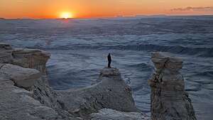 Crazy person waiting for sunrise